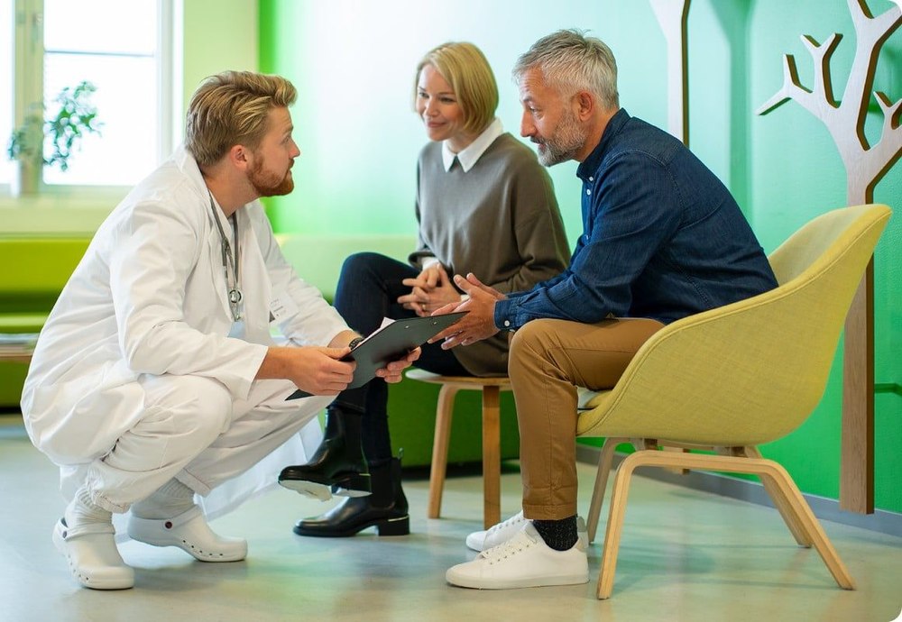 Healthcare professional talking to patient