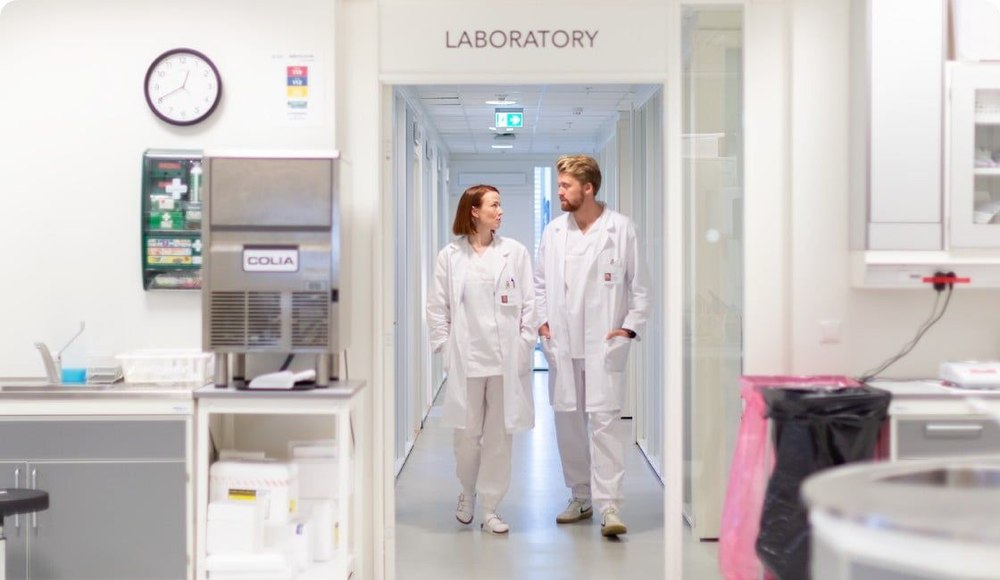 Healthcare professionals in hospital corridor